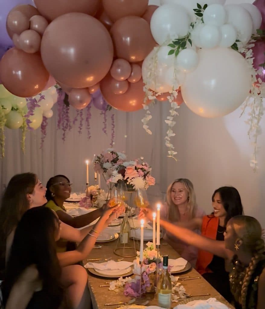 Group of women celebrating at Glow with the Flow event