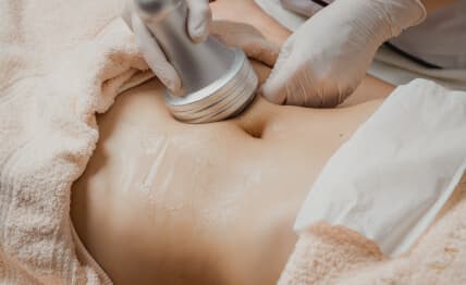 Non-surgical body reshaping with ultrasonic cavitation.